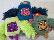 Load image into Gallery viewer, Three colorful plush toys with unique designs on a white background
